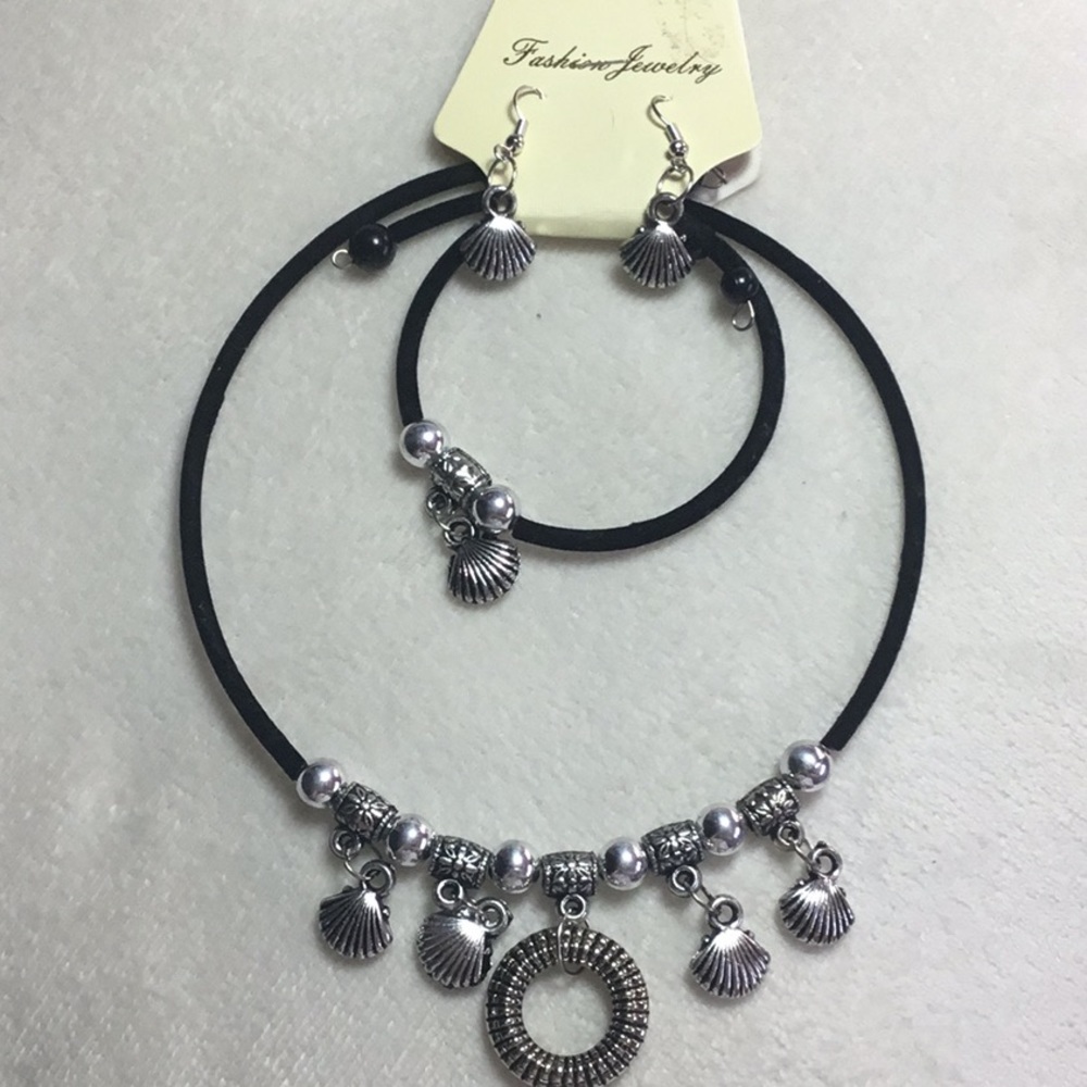 Set of necklace bracelet and earrings.